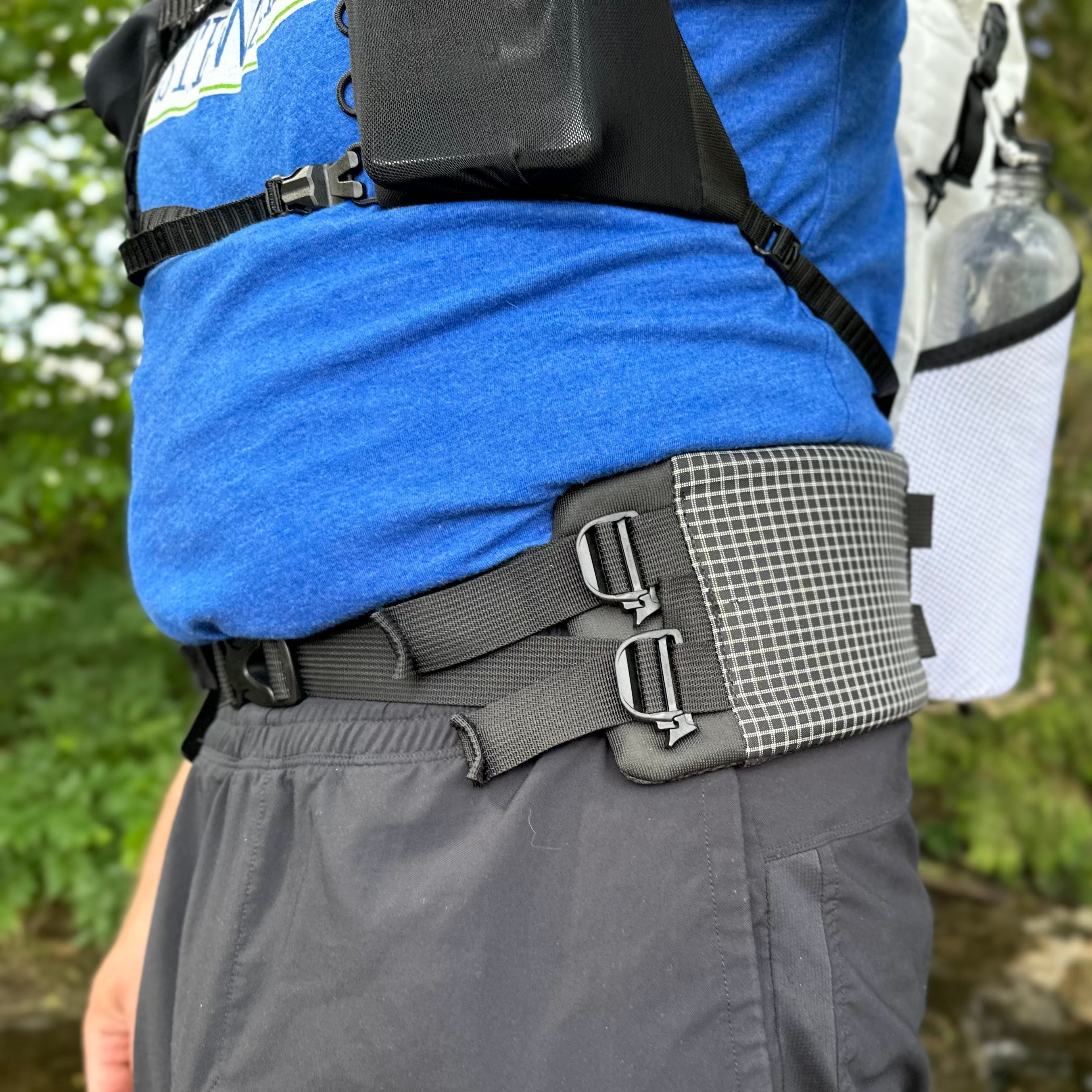 Padded waist clearance belt for backpack